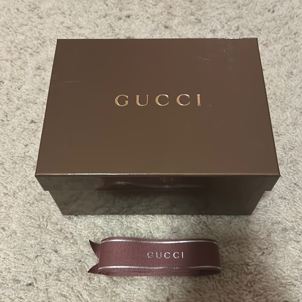Gucci box with tissue paper and ribbon